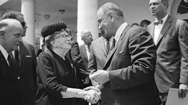 Americans Act Signing handshake