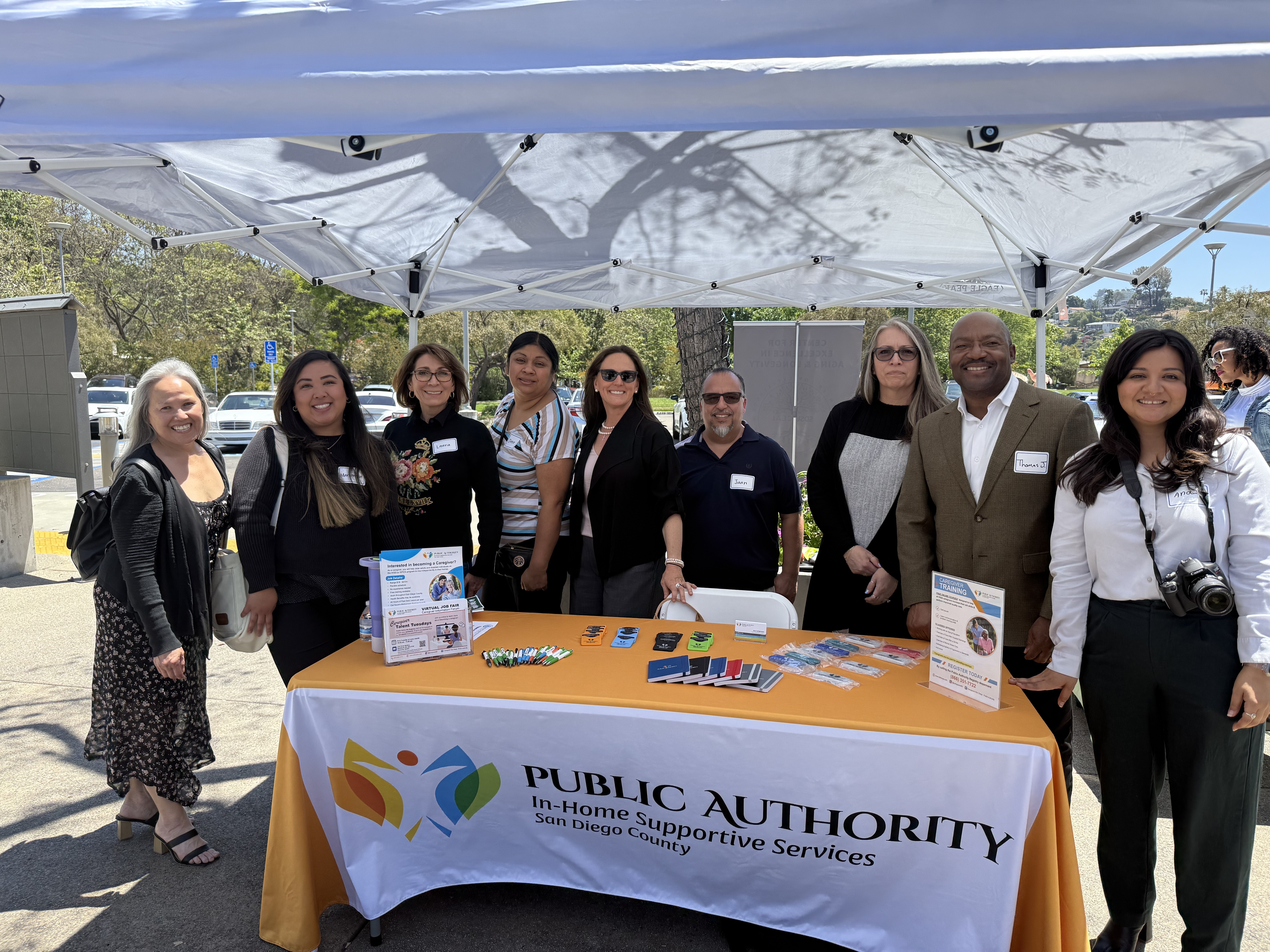 Booth with volunteers around it