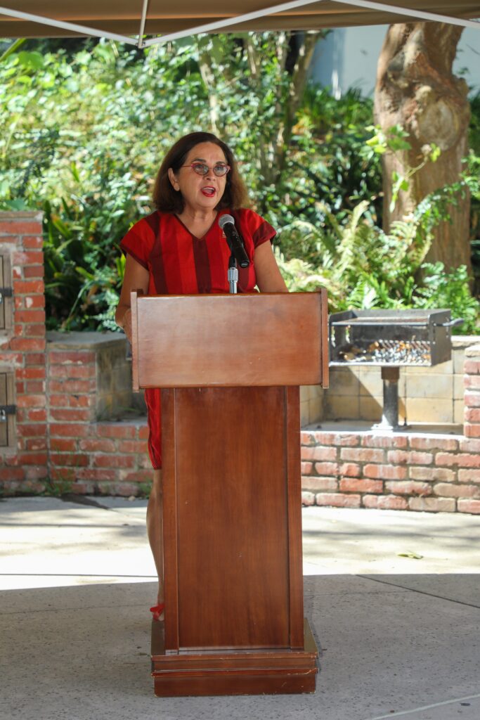 Adela de la Torre giving a speech