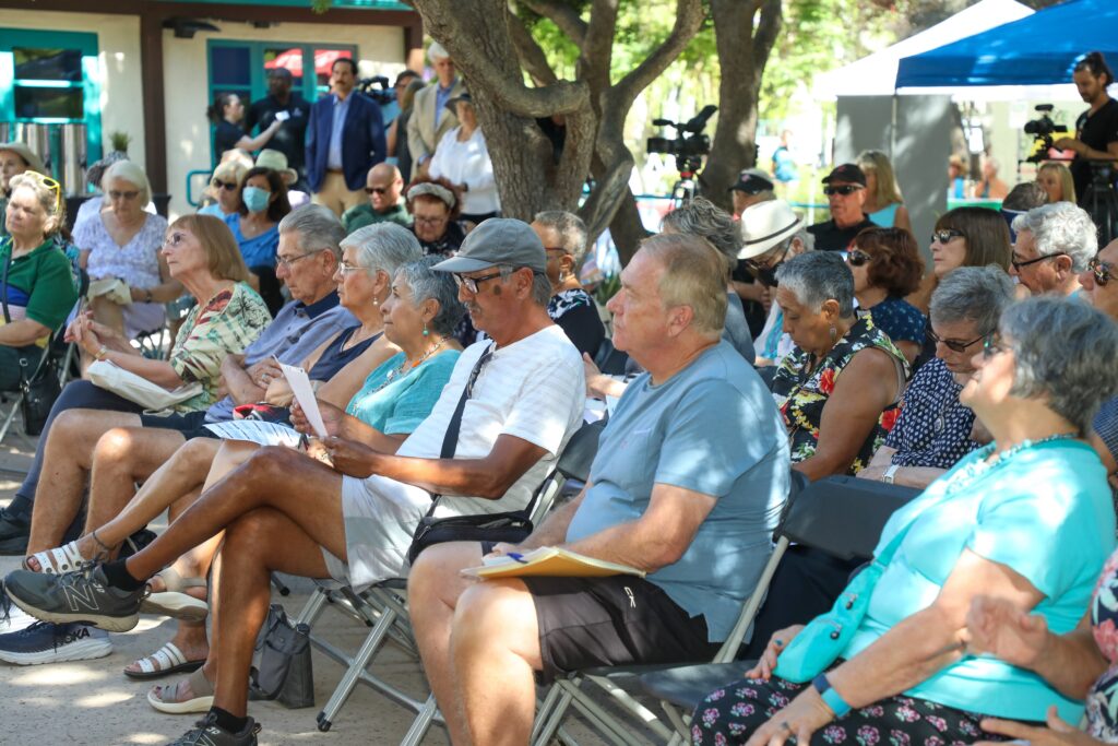 Elderly audience listening to a speech