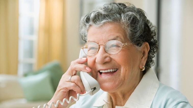 Elderly Woman on the phone with a friend