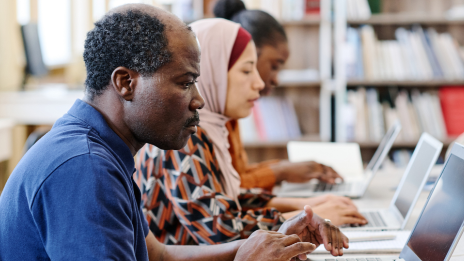 People working in library