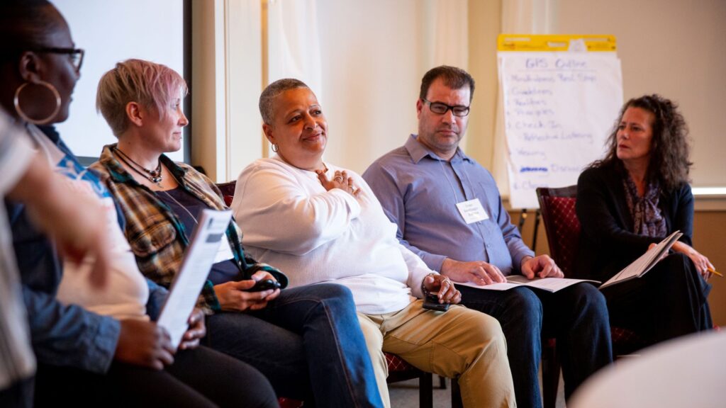 Woman talking at a peer support group